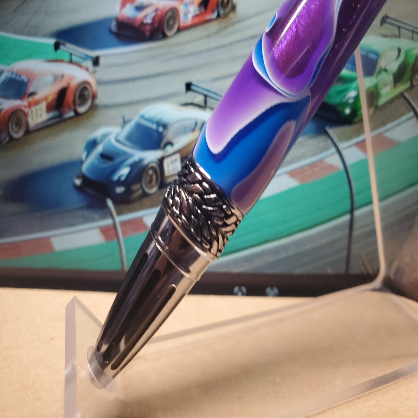 Close-up of a tire tread design on gearshift pen