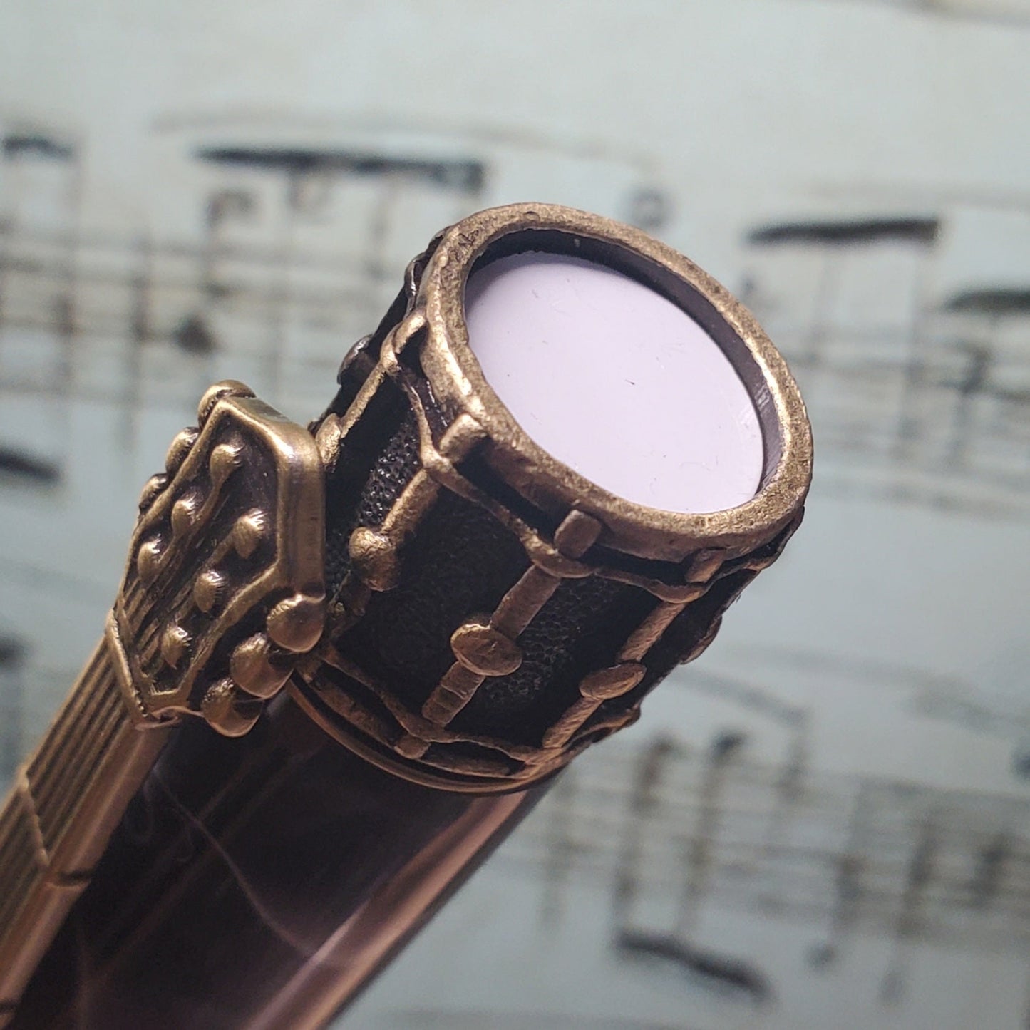 snare drum cap on music pen