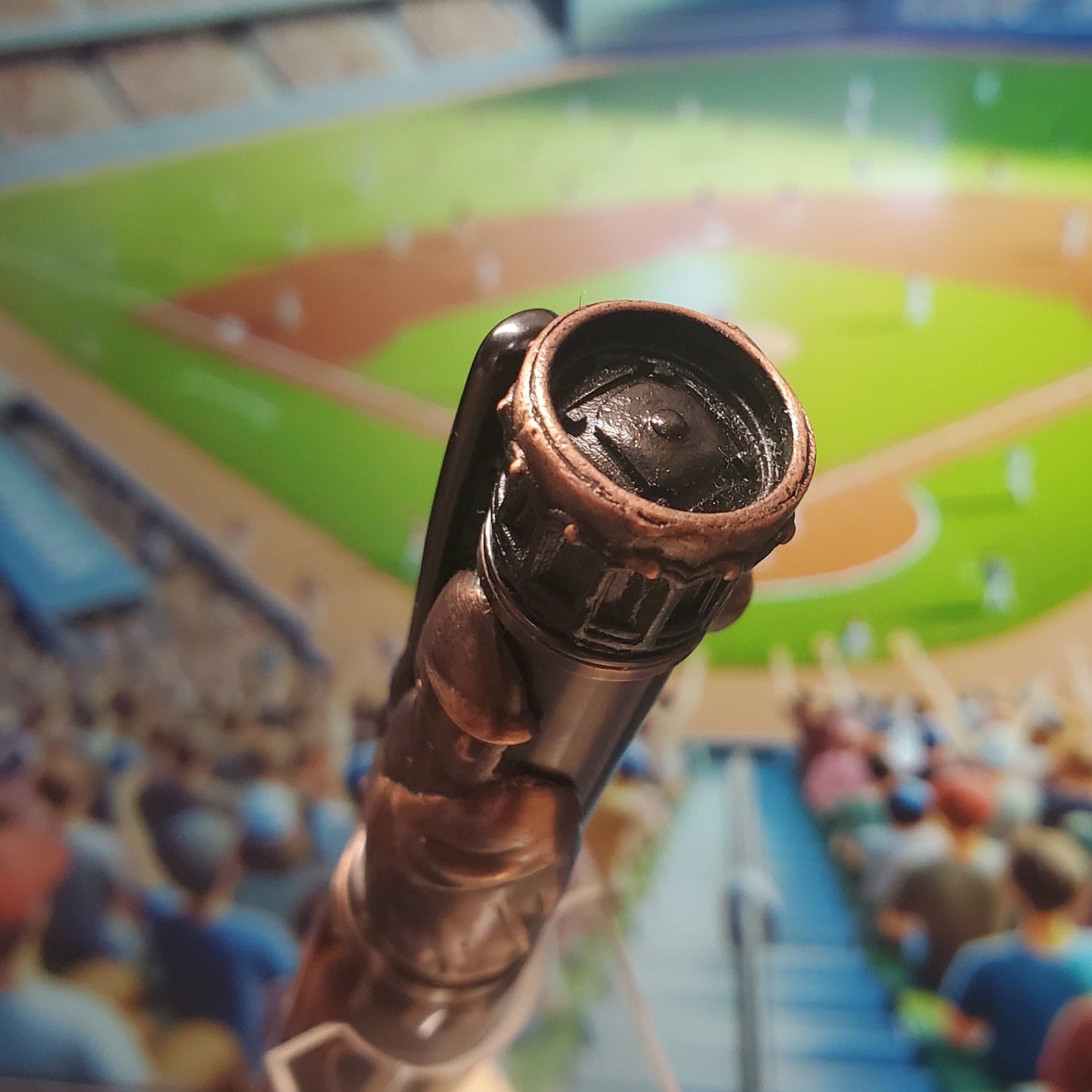 Cap designed to look like a baseball stadium