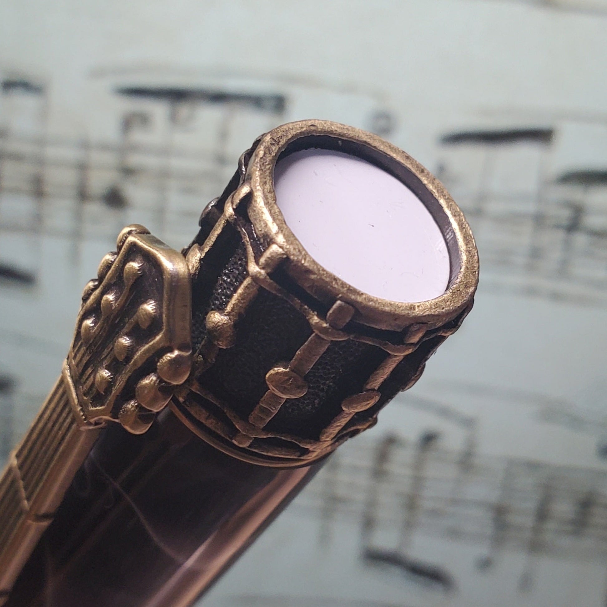 snare drum cap on music pen